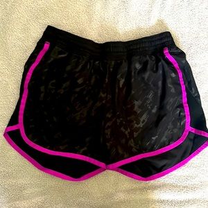 Black running shorts with purple details
